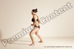 Underwear Martial art Woman White Moving poses Average long colored Dynamic poses Academic